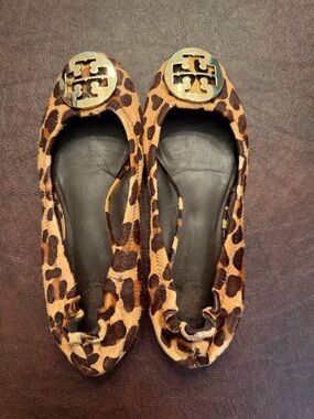 Tory Burch animal print flat with gold detail, size 7.5 medium